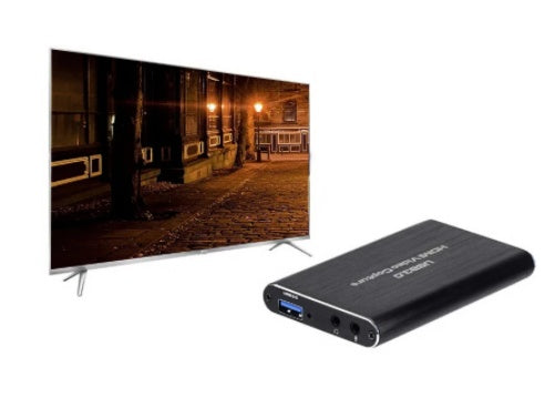 Black HDMI USB capture card shown with a connected display