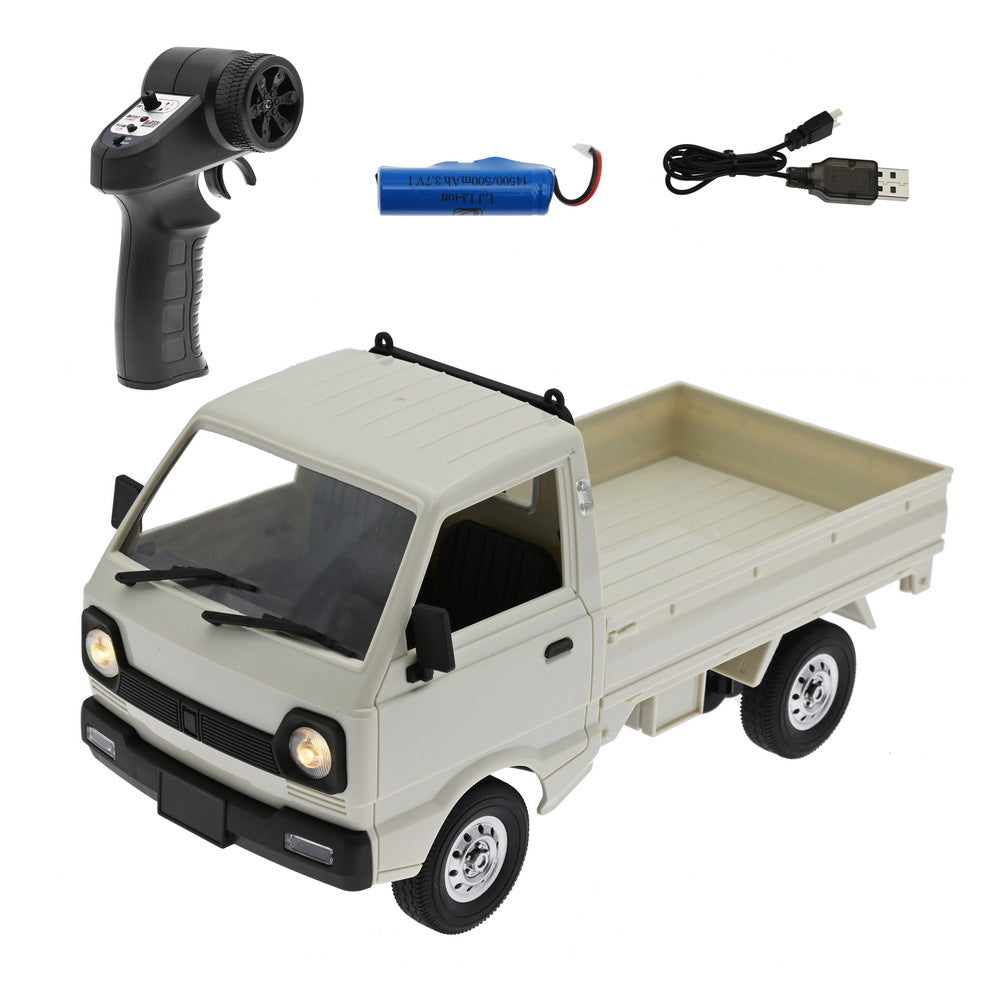 White mini RC truck with remote control, rechargeable battery and USB charging cable